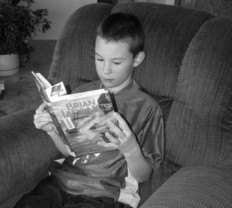 Proficient Reader enjoying a book