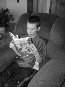Proficient Reader enjoying a book